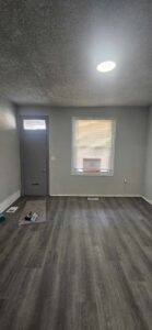 Living room of renovated 4-bedroom rental property in Strawberry Mansion, Philadelphia